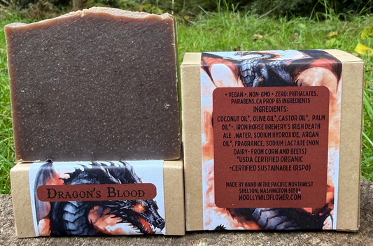 Bar of soap with packaging labeled 'Dragon's Blood' in a natural setting