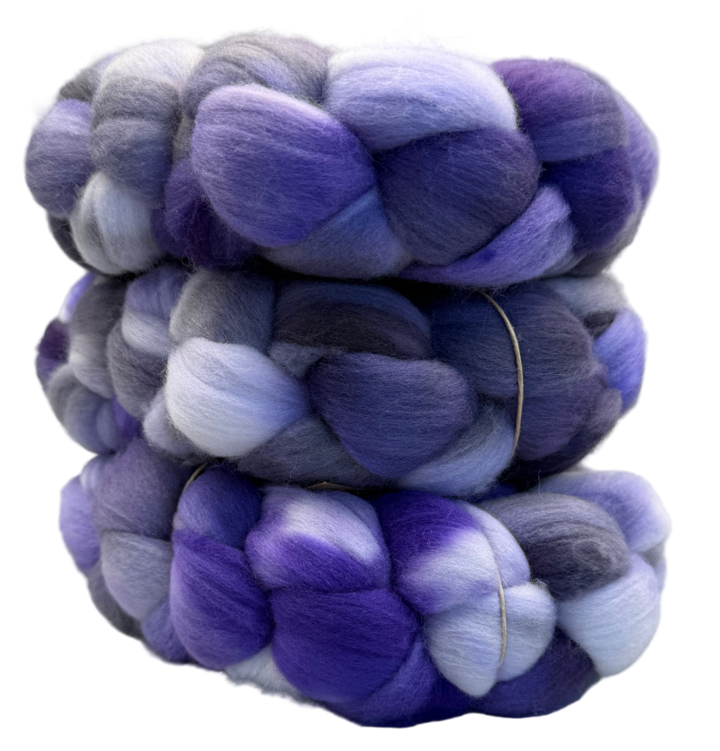Stack of purple and blue fiber roving on a gray background