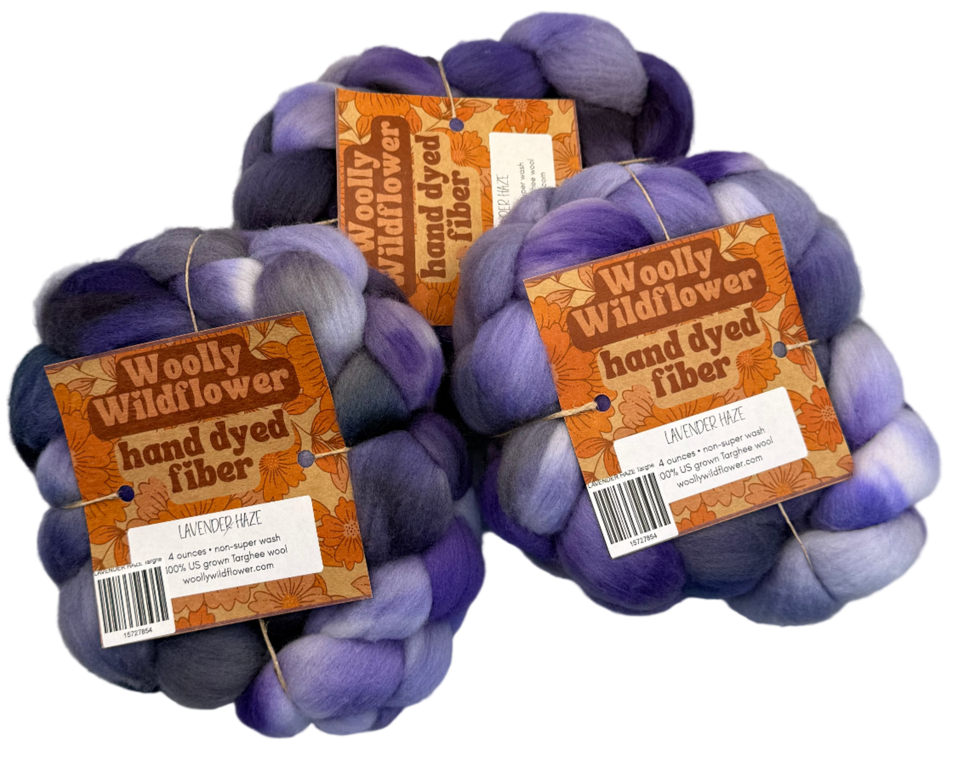 Three skeins of purple and gray hand-dyed fiber with 'Woolly Wildflower' labels on a gray background.