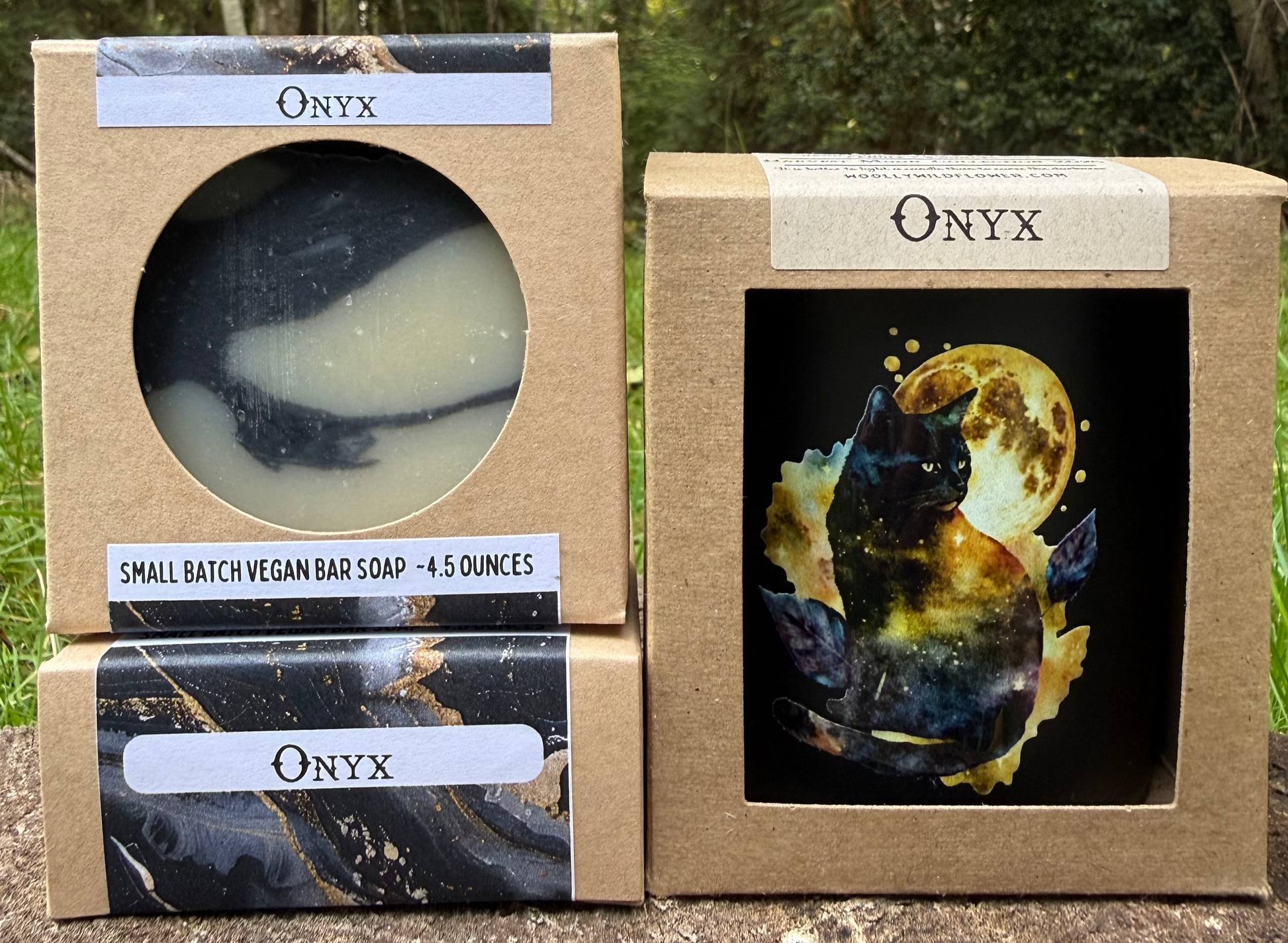 Onyx soap bars and packaging with a forest background