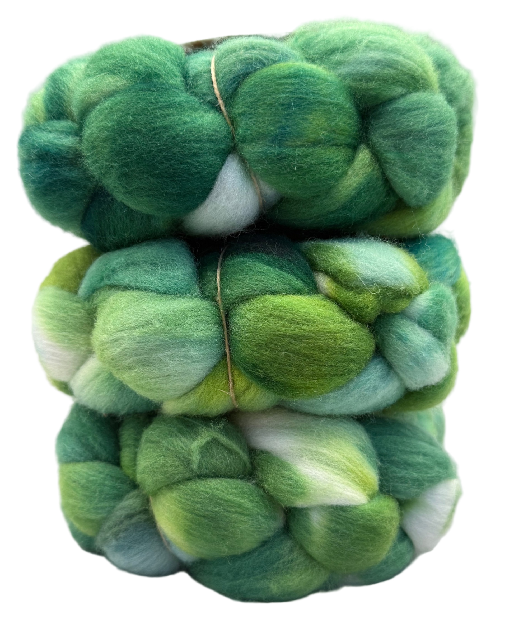 Stack of green and white fibers on a white background