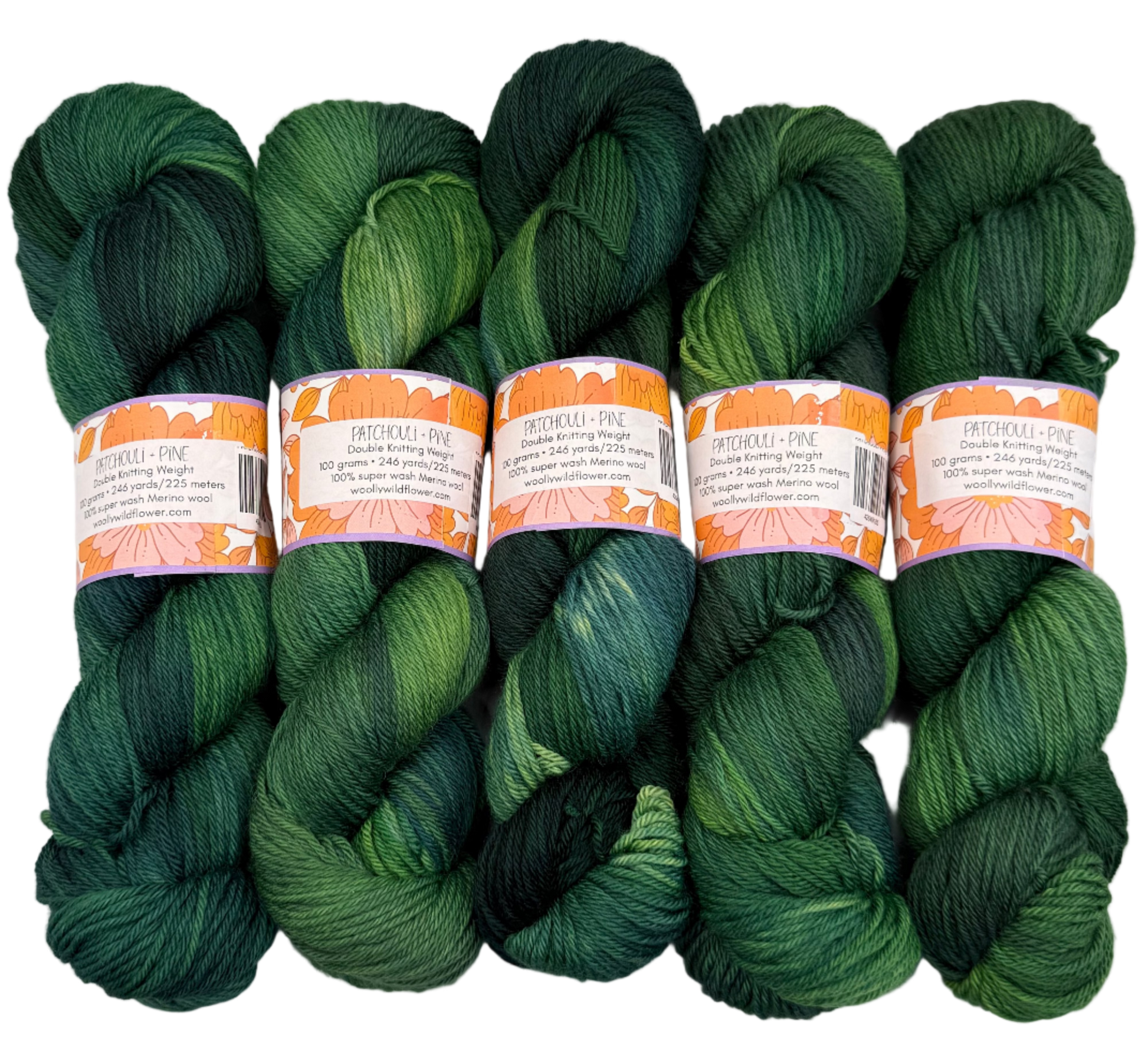 Five skeins of green yarn with labels on a white background