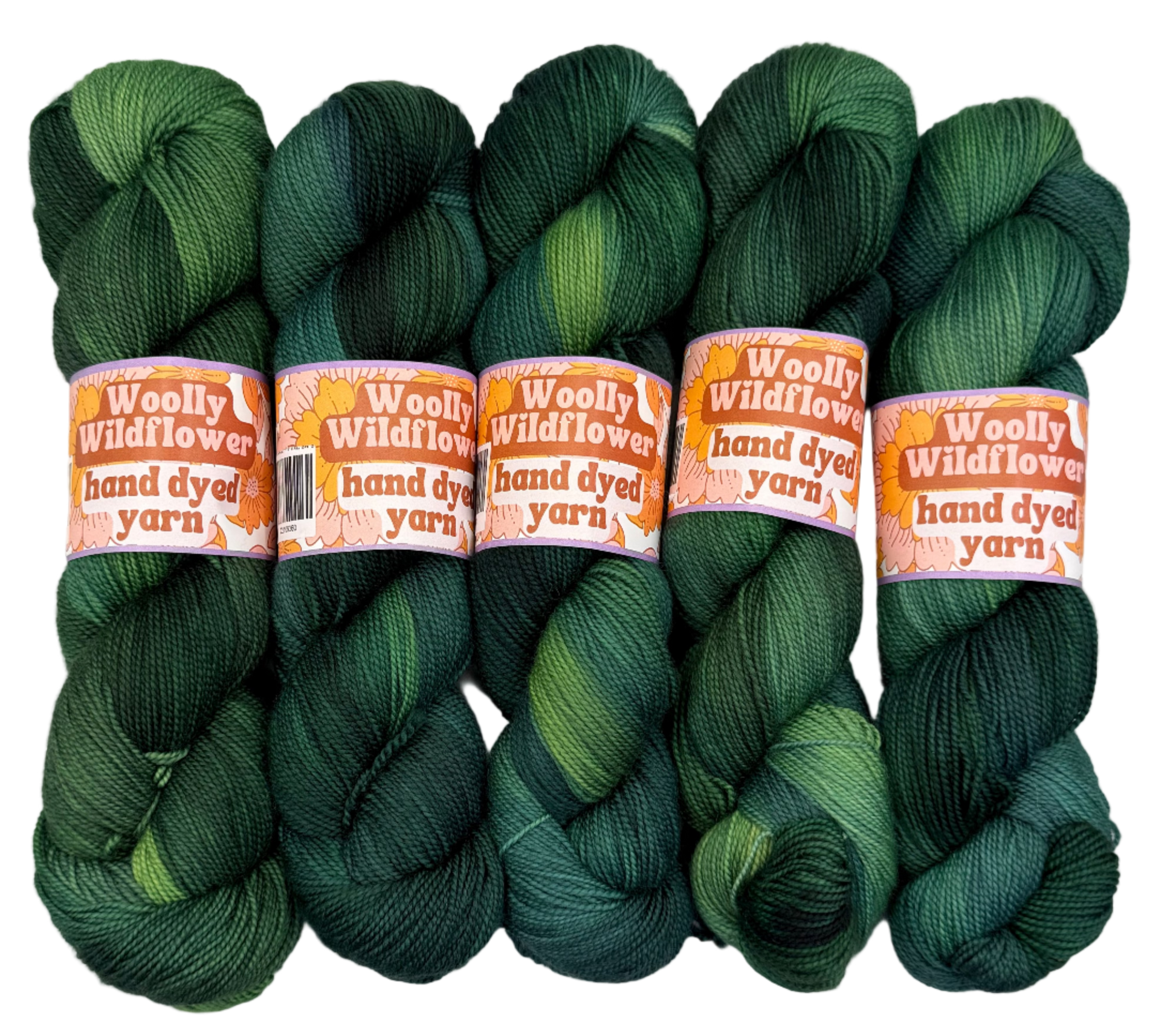 Four skeins of green hand-dyed yarn with 'Woolly Wildflowers' labels on a white background