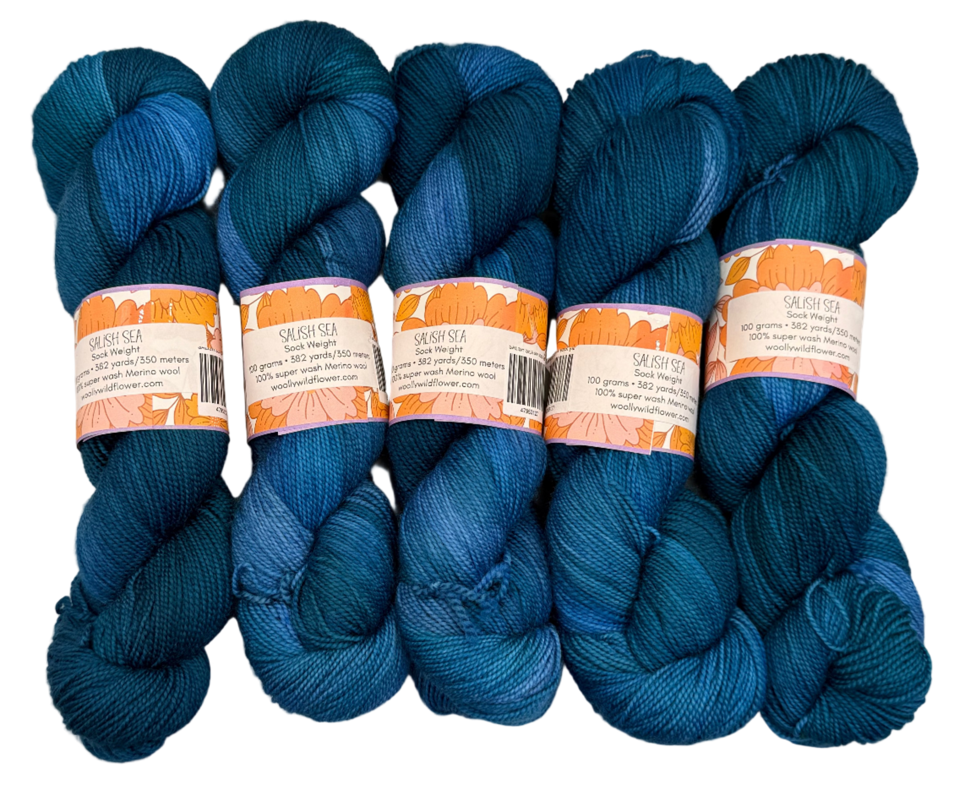Five skeins of blue yarn with labels on a light gray background