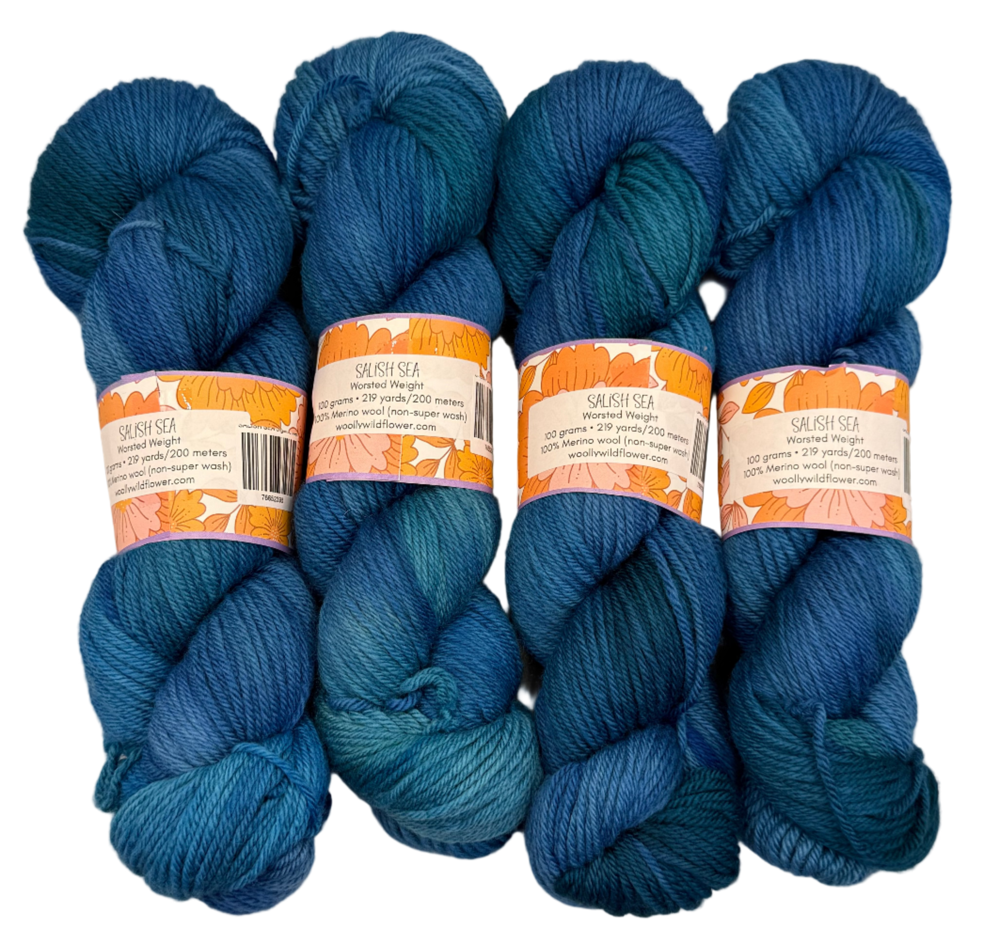 Five skeins of blue yarn with labels on a light gray background
