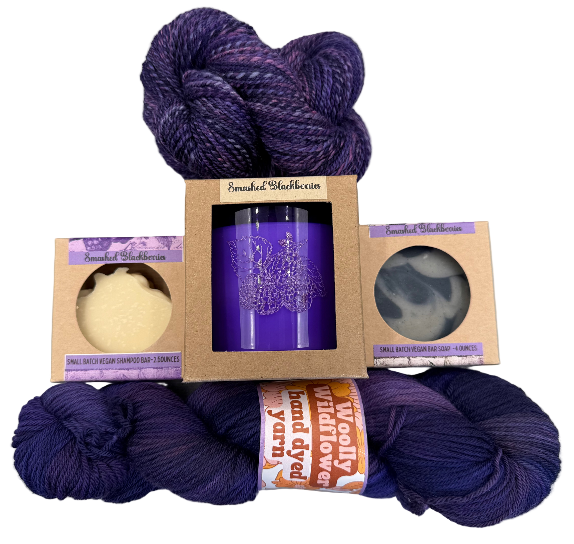 Purple yarn skeins with packaging on a gray background