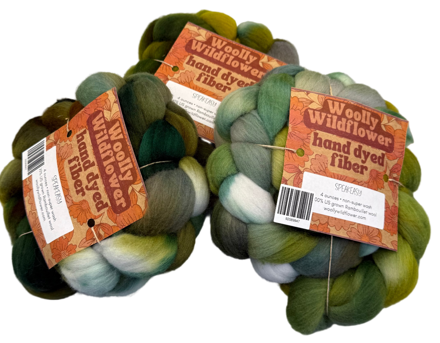 Three skeins of hand-dyed fiber in green and brown tones with 'Woolly Wildflower' labels on a gray background.