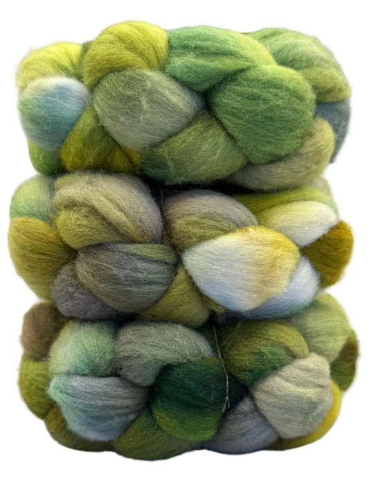 Braided skein of multicolored fiber in greens and brown tones