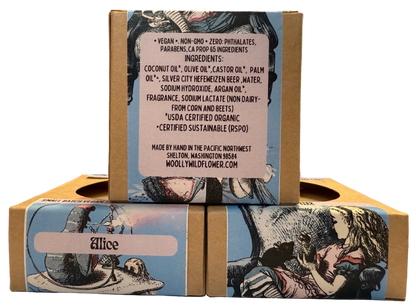 Product packaging with artistic design and text on a neutral background