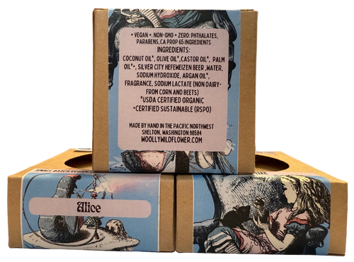 Product packaging with artistic design and text on a neutral background