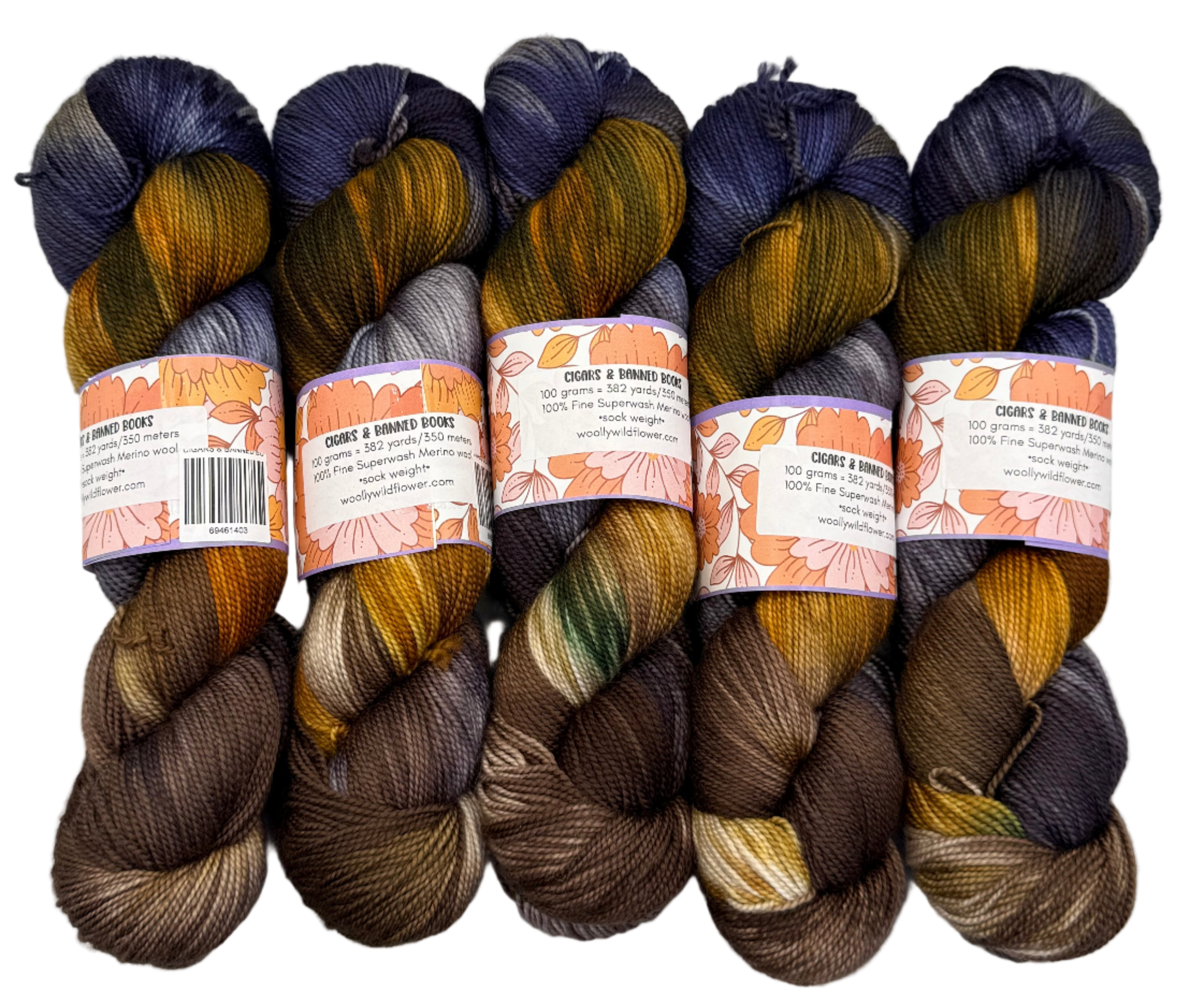Five skeins of multicolored yarn with labels on a light gray background