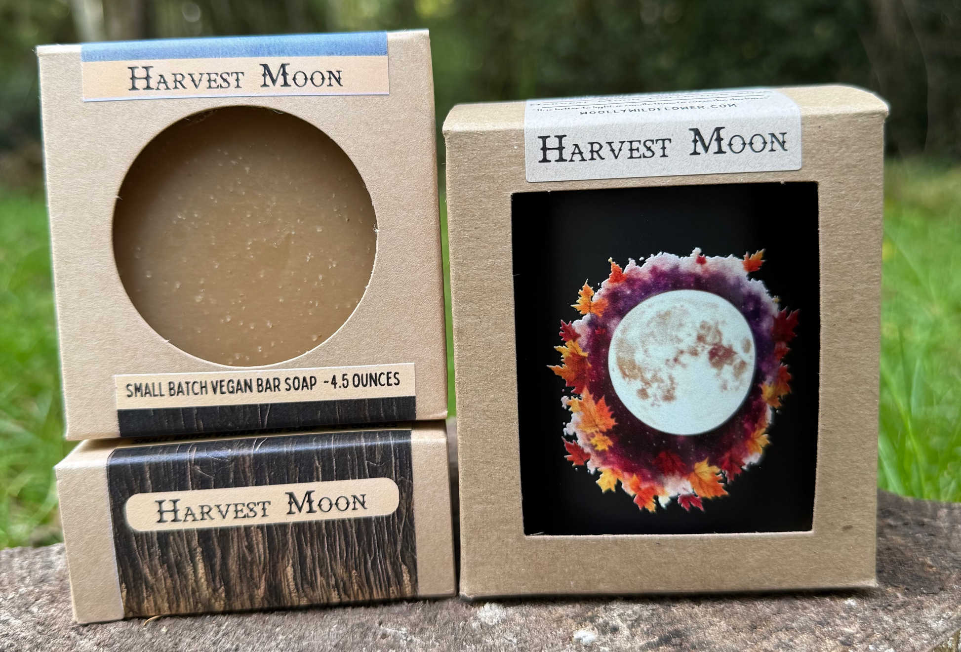 Harvest Moon soap  and candle packaging with a natural background