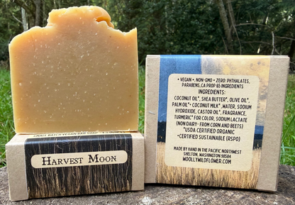 Bar of soap with a label on a natural background