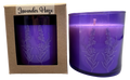 Purple candle with lavender design in packaging labeled 'Lavender Haze' on a gray background