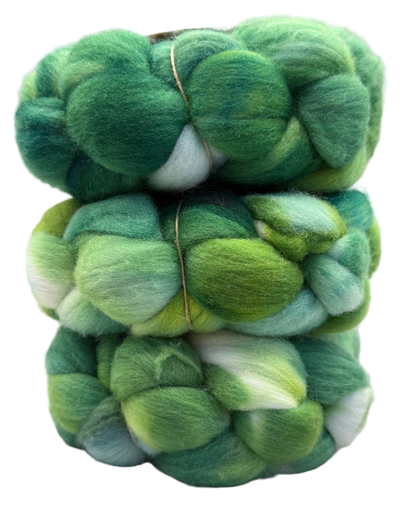 Stack of green and white fibers on a white background