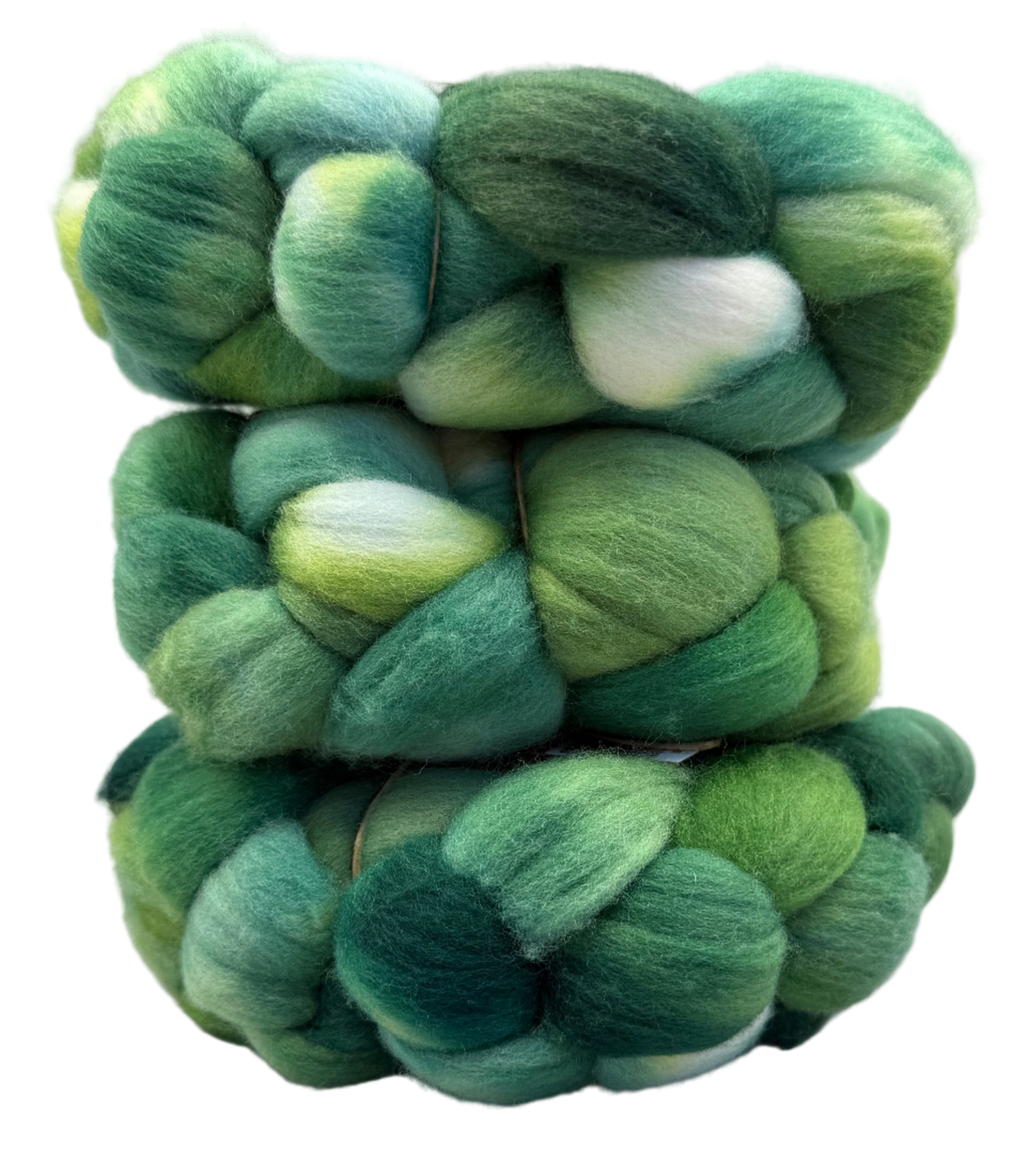 Stack of green fiber on a gray background