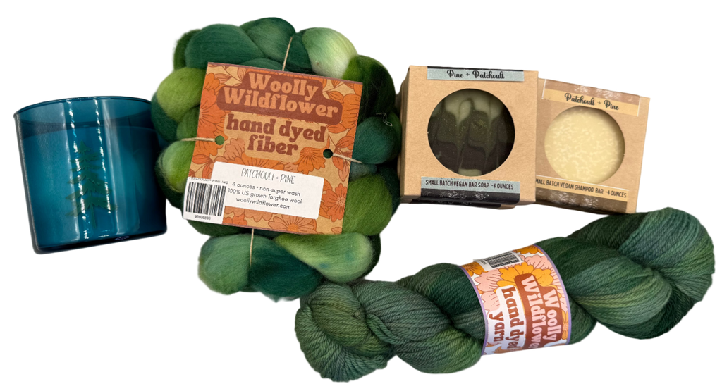 Green hand-dyed yarn with packaging on a gray surface