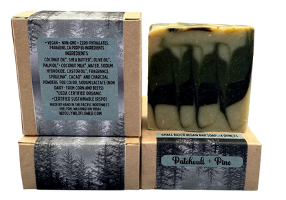 Bar of soap with a wooden box on a gray background