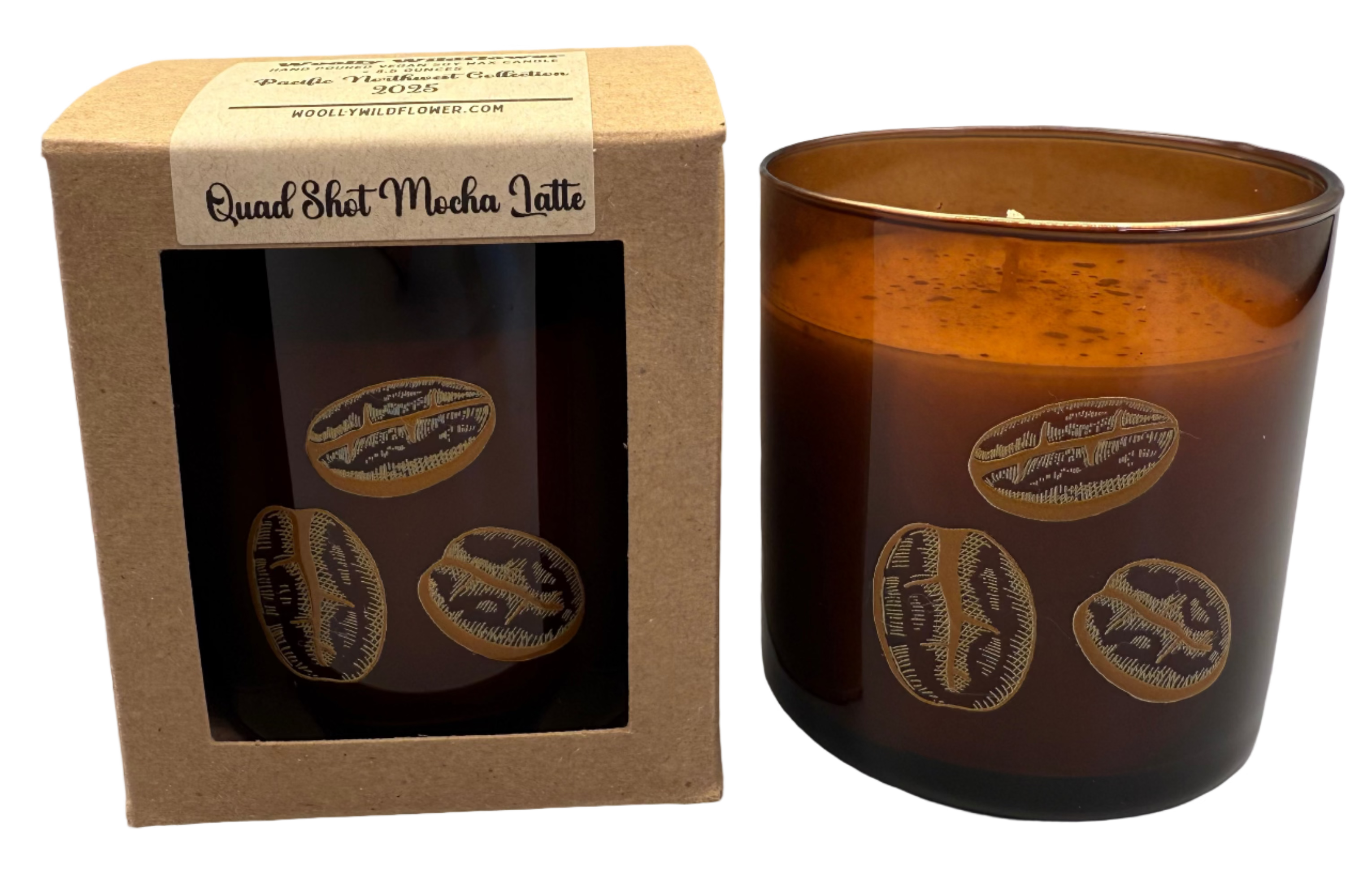 Brown glass candle with decorative elements next to a cardboard box on a white background