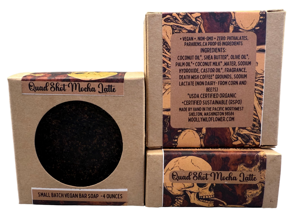 Three cardboard boxes with a soap bar inside on a gray background