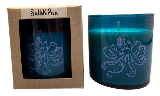 Blue candle with octopus design and packaging labeled 'Salish Sea' on a white background