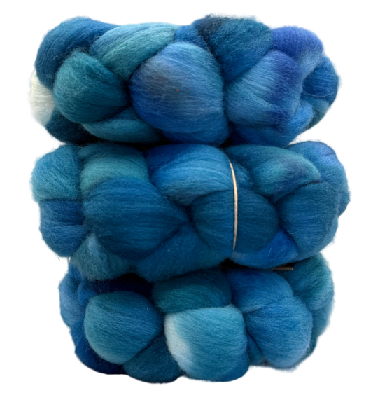 Stack of blues and greens fiber on a white background