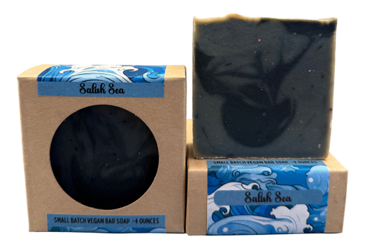blue soap bar in a cardboard box with blue wave design on a gray background