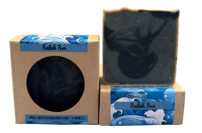 blue soap bar in a cardboard box with blue wave design on a gray background