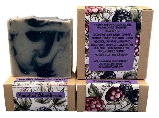 Bar of soap with a floral packaging label on a gray background