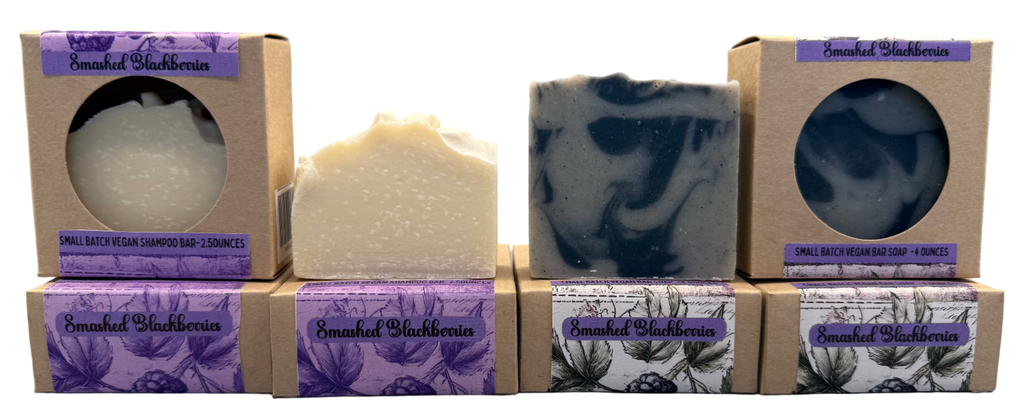 Three soaps with packaging on a gray background