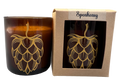 Candle with hop design and Speakeasy packaging on a white background