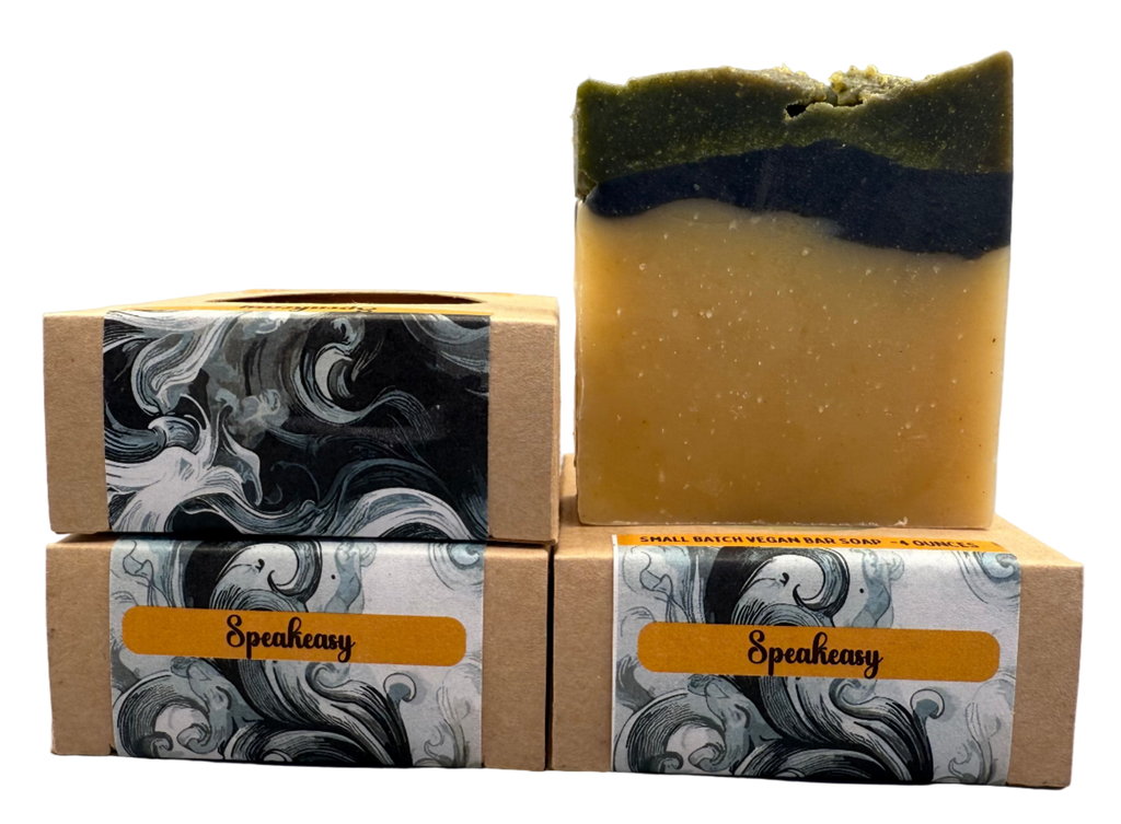 Two stacked soap bars with Speakeasy branding on a gray background